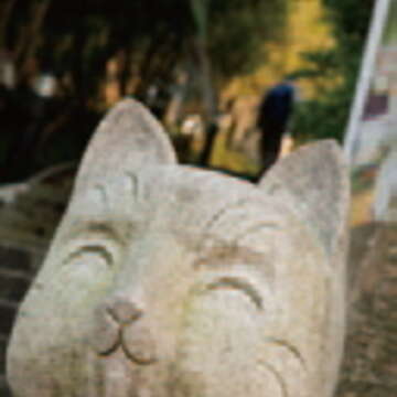 乘著貓纜上貓空，邂逅微笑貓咪石雕，心情隨之飛揚。（圖／JackRabbit提供）