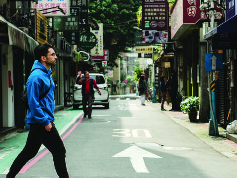 Ku enjoys strolling through the streets, exploring food and experiencing the human touch of Taipei. (Photo / Yi Choon Tang)