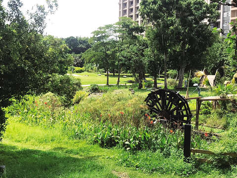A Traditional waterwheel, commonly seen in a rural Hakka village, is set out in Taipei City Hakka Cultural Park.