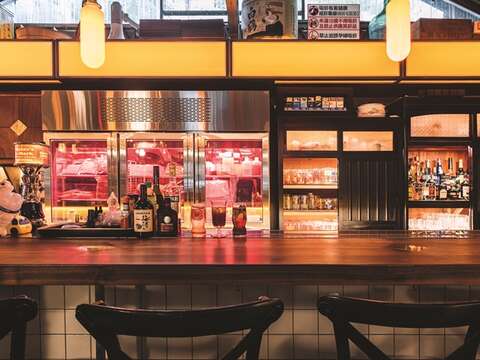 Large fridges and nostalgic cupboards behind the bar are both stylish and practical.