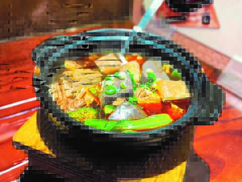 The mala broth seeps into savory stinky tofu and blood curds, making it one of the most popular hot pot options in Taiwan.