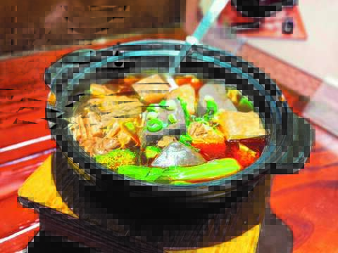 The mala broth seeps into savory stinky tofu and blood curds, making it one of the most popular hot pot options in Taiwan.