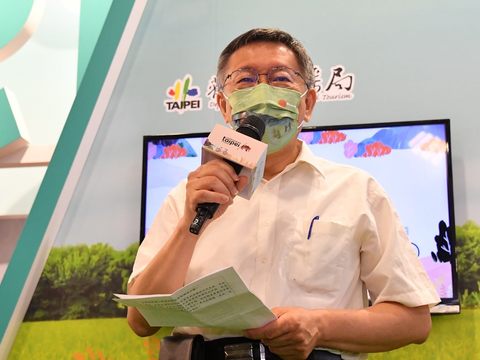 柯文哲市長在夏季旅展台北館中推薦「來稻關渡」系列活動及「河濱單車輕旅行」(圖片來源：臺北市政府觀光傳播局)