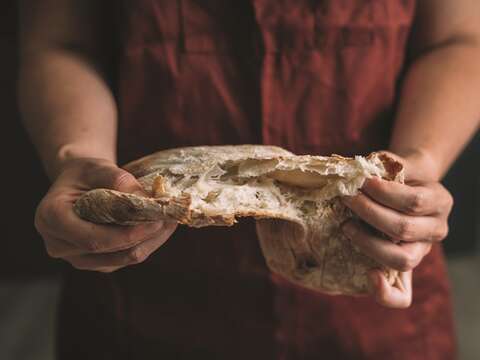 Tearing the ciabatta bread piece by piece with one’s hands is the most authentic and tasty way to enjoy it.