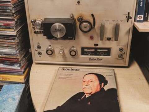 An antique reel-to-reel tape machine sits in the corner of the RK Record.