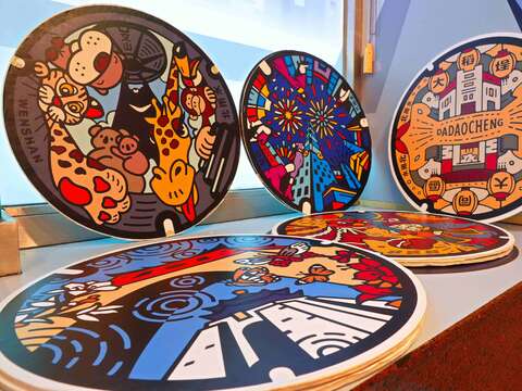 It’s a must-see for all fans of unique painted manhole cover designs!