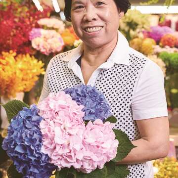 士東市場自治會會長許桂招大力整頓士東市場。(攝影/黃宇凡)