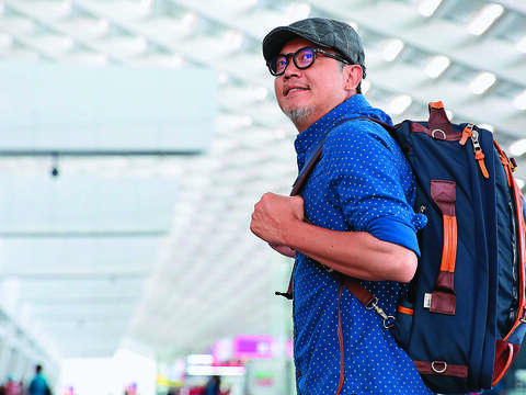 工頭堅推廣島內旅行，他認為台北市是適合一個人旅行的城市。（攝影／賴智揚）