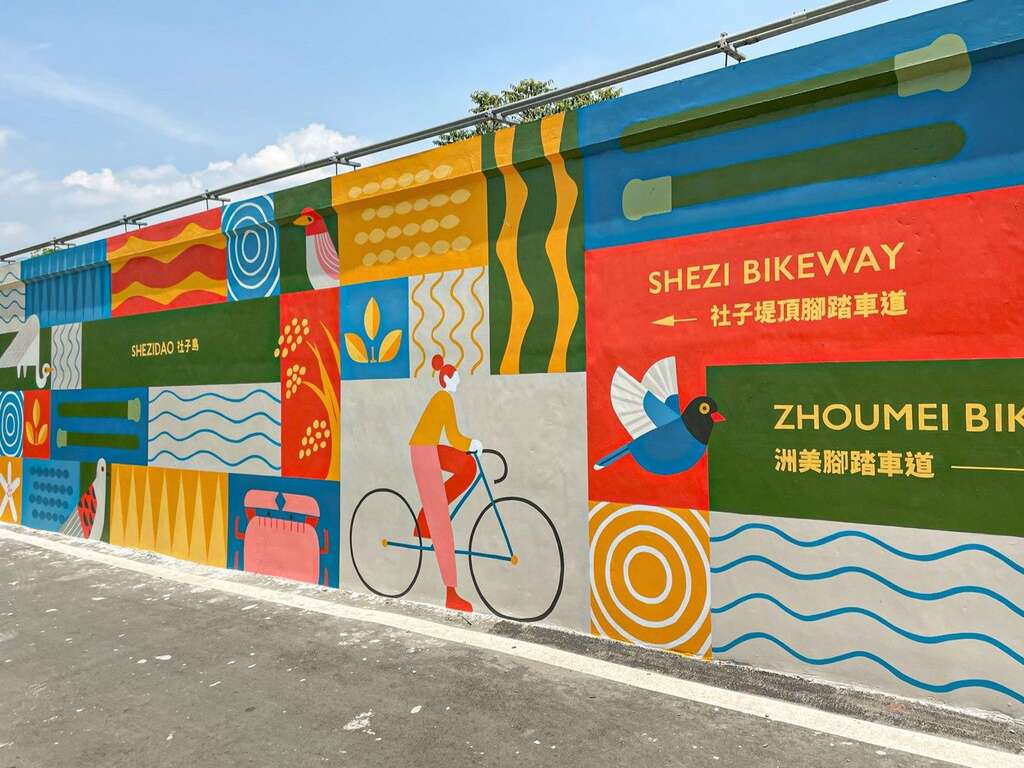 堤壁新作位於百齡左岸河濱公園自行車道入口處旁(圖片來源：臺北市政府工務局水利工程處)
